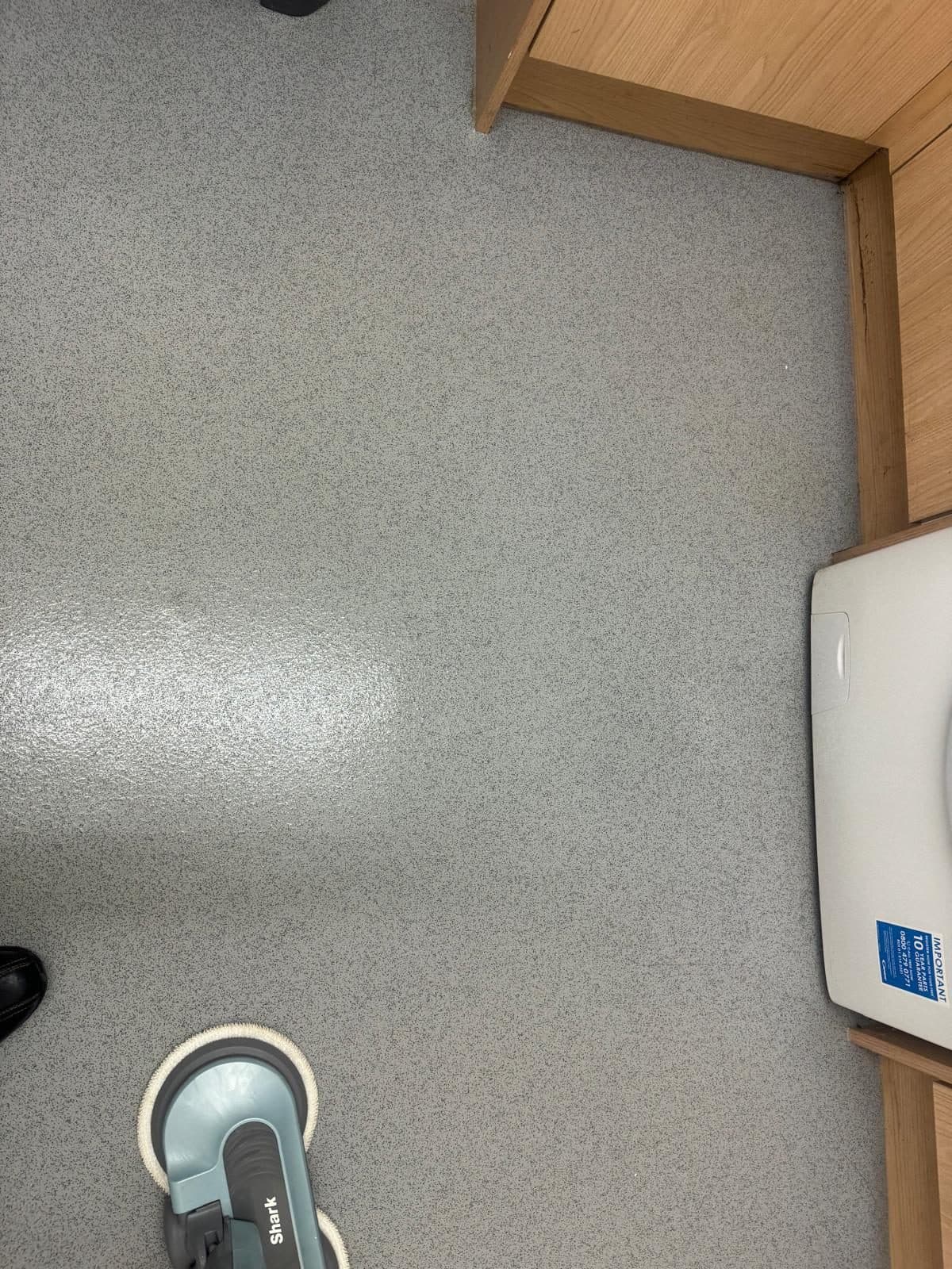 The kitchen floor after cleaning, even and bright